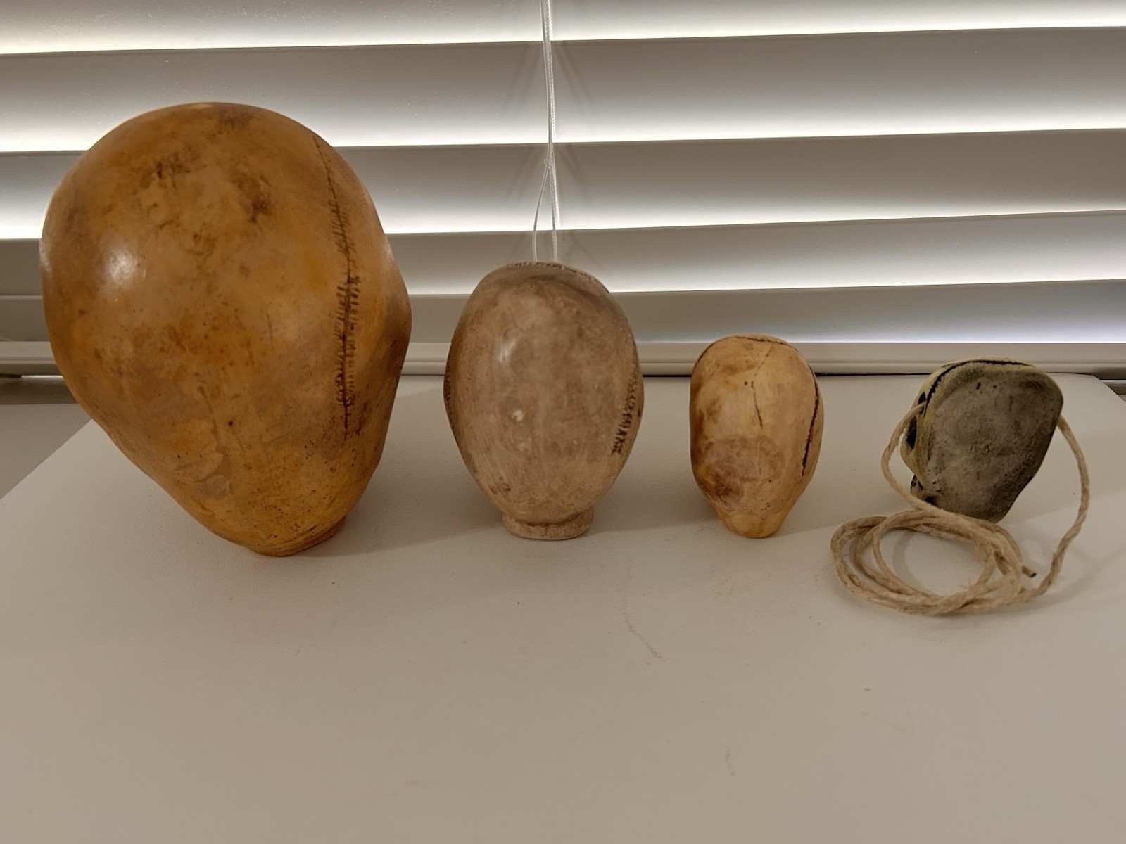 4 EA. RANDOTTI ORIGINALS LARGE, MEDIUM, PIXIE,& FLAT BACK PIXIE SKULLS ALL GLOW