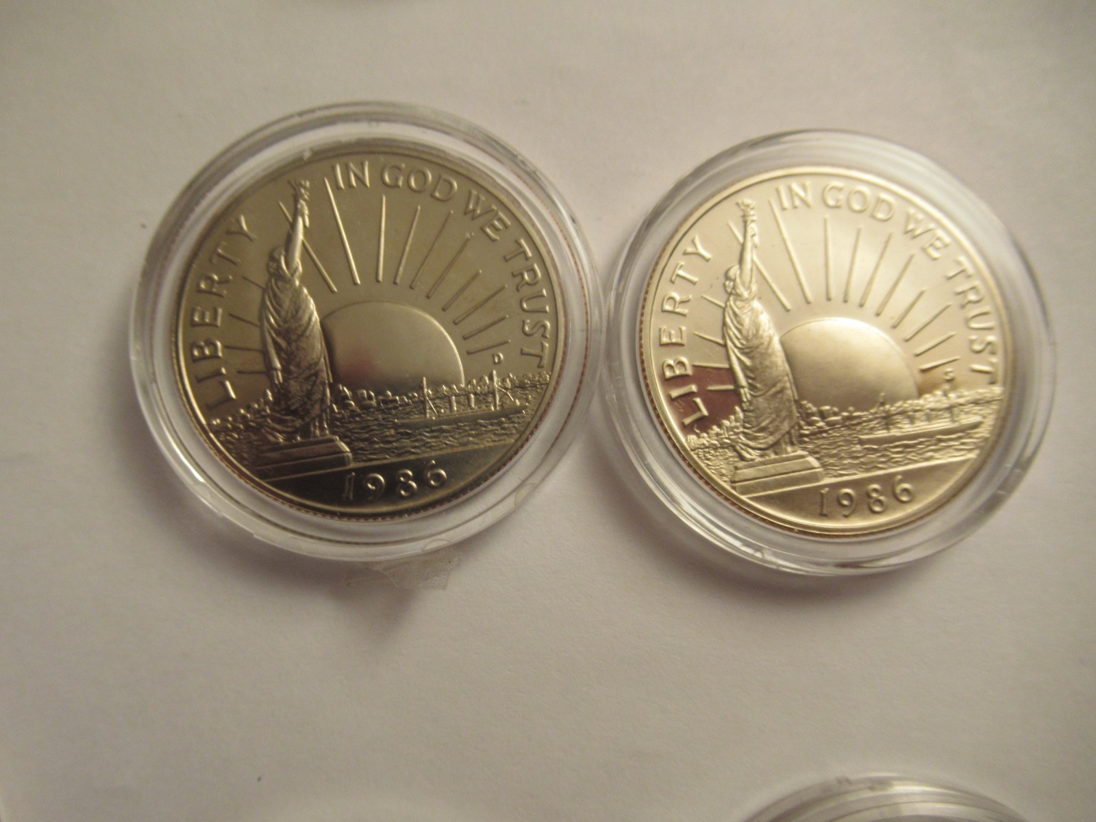 Lot of 11 US Clad half dollars, mix dates, w/ capsules