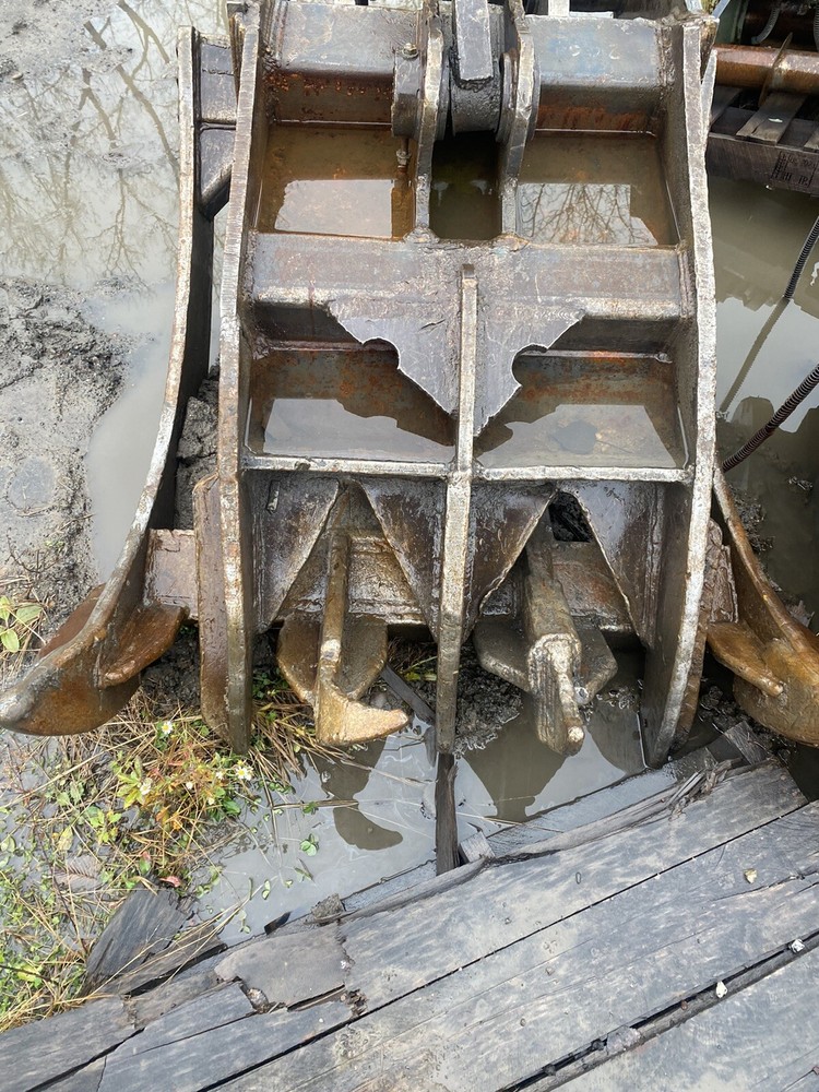 excavator thumb grapple