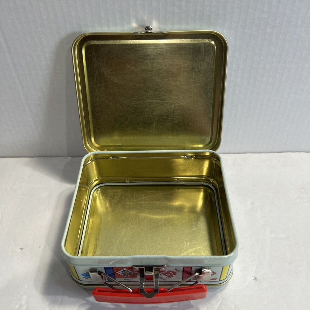 2000 HASBRO MINI MONOPOLY "ADVANCE TO GO" TIN CARRYING CASE
