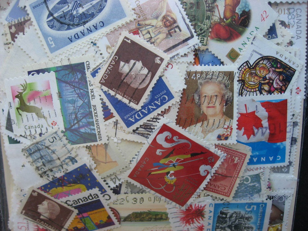 Canada colossal mixture (duplicates,mixed cond) 2000 old,new,35%comems,65%defins