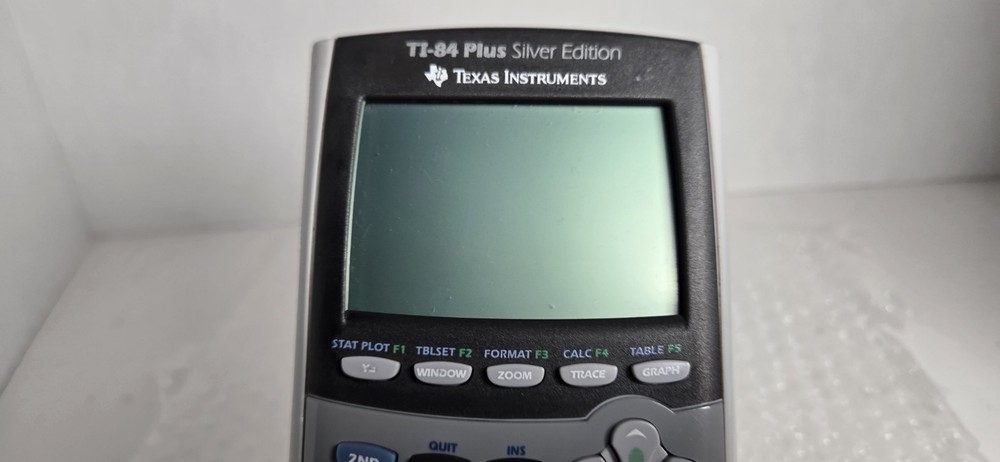 Texas Instruments TI-84 Plus Graphing Calculator Silver Edition Tested Cleaned