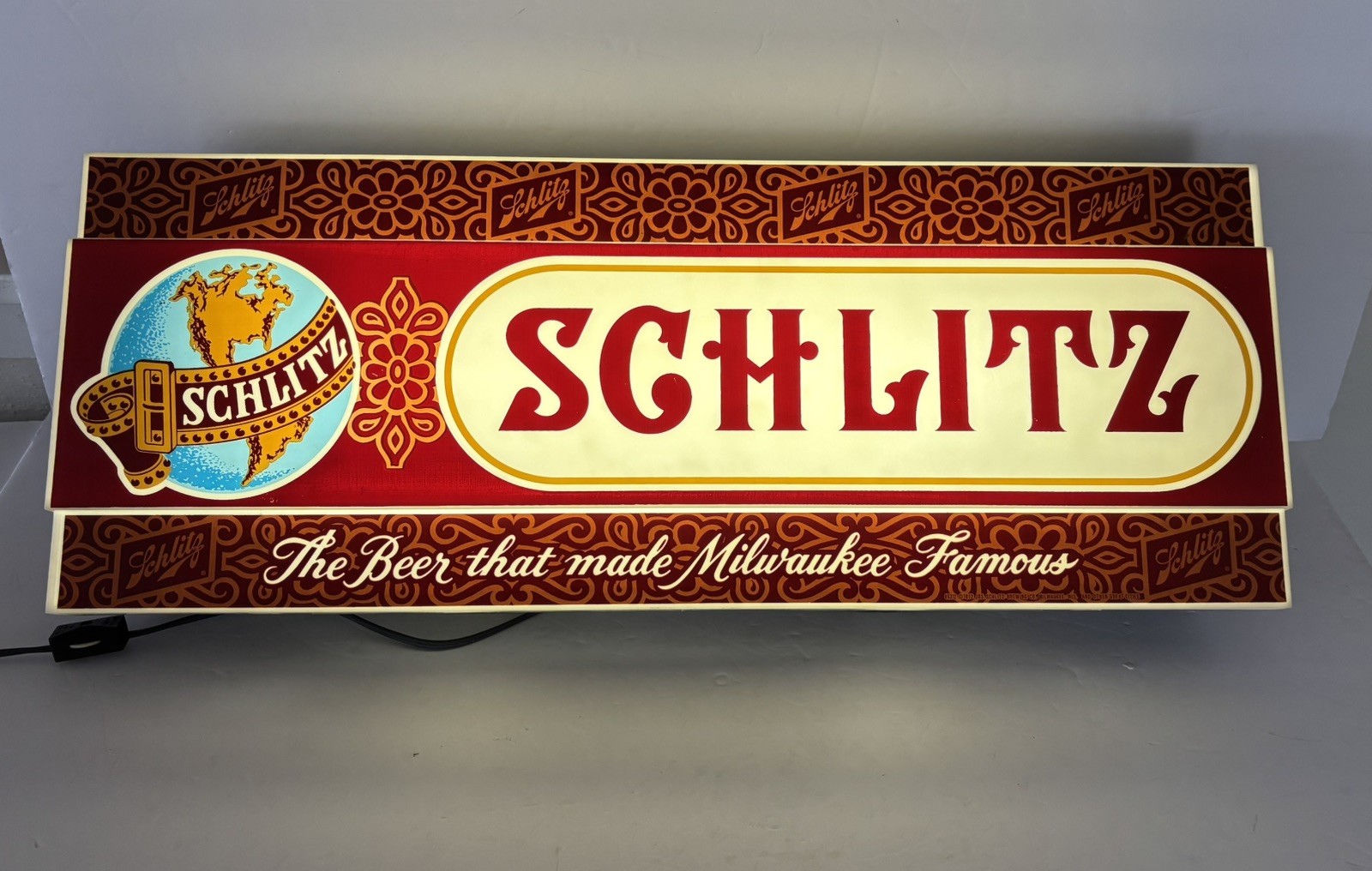 VINTAGE ADVERTISING SCHLITZ BEER LIGHTED ELECT  SIGN WORKS  22” X  8.5”