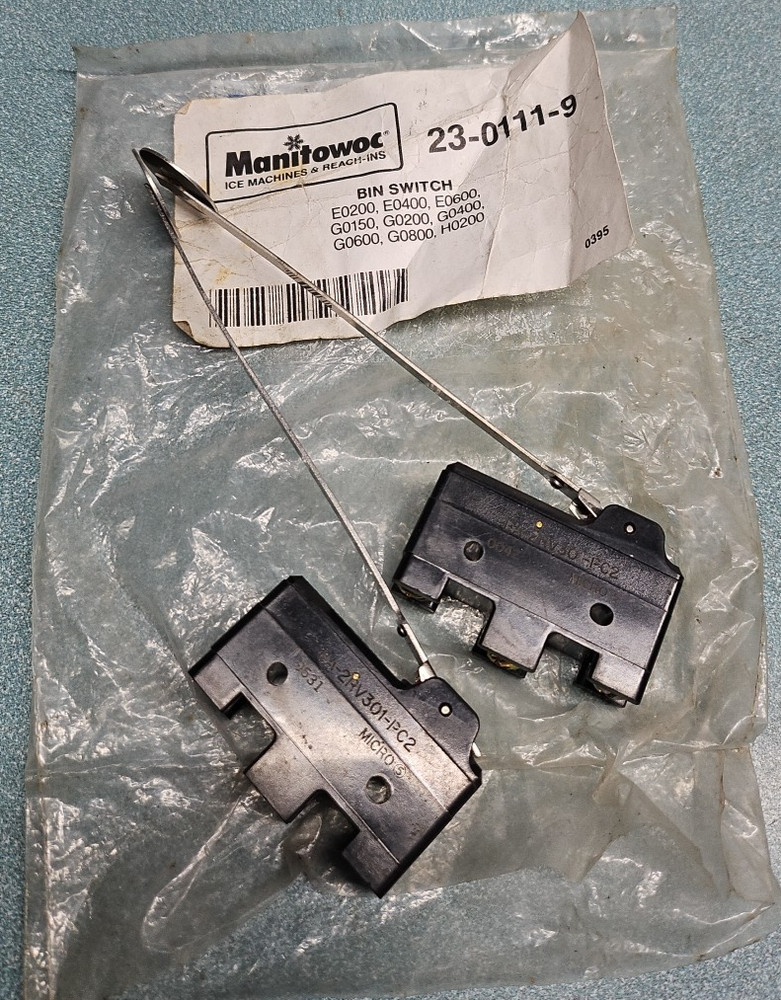 Assorted Manitowoc Ice machine parts.