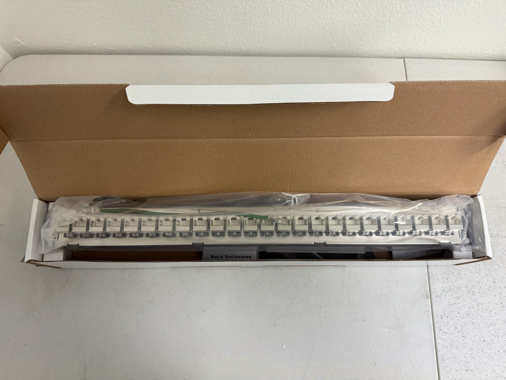 TrippLite Shielded Cat6A Rackmount Feed Through Patch Panel Model N254-024-SH-6A