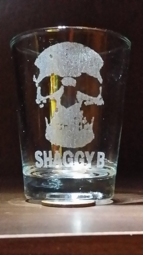 2 Skull etched shot glass. Can be personalized. Different designs available!