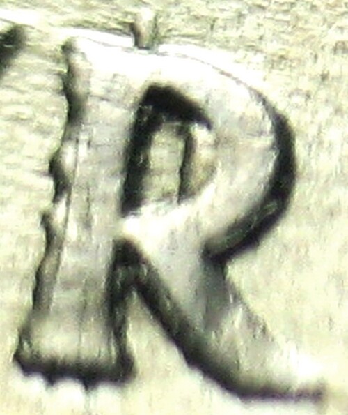 Error: 2001P RI Quarter Interior die break, chips heavy die distortion BU