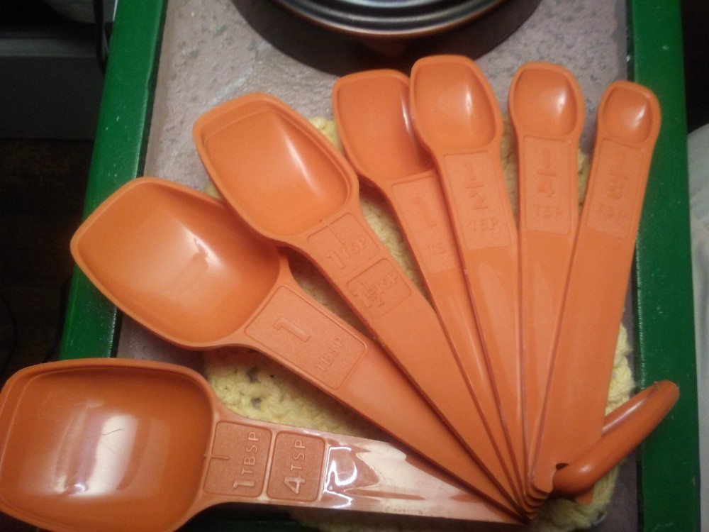 vintage Tupperware measuring spoons burnt orange