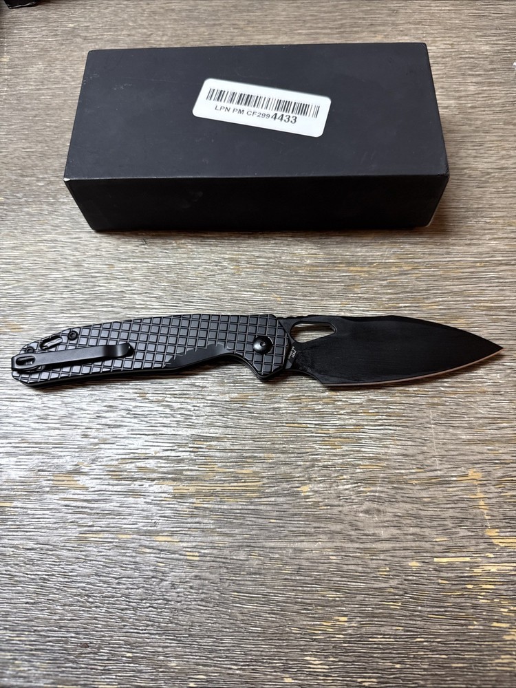 CJRB J1931 Frack Button Lock Frag Pattern Black SS Folding Knife