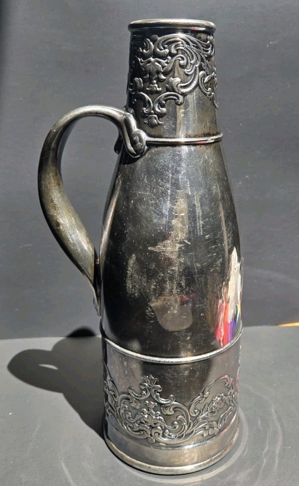 Wilcox International Silver Company silverplate engraved decanter with handle
