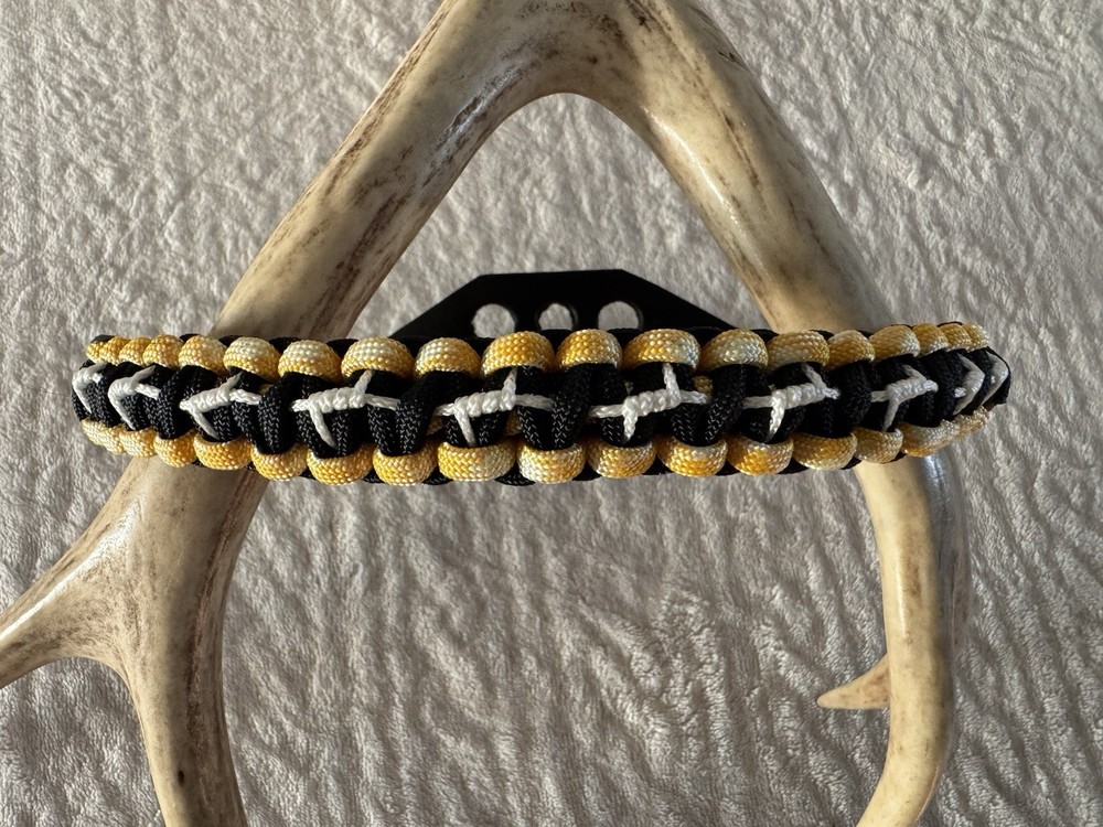 Black, Yellow And White Bow Wrist Sling