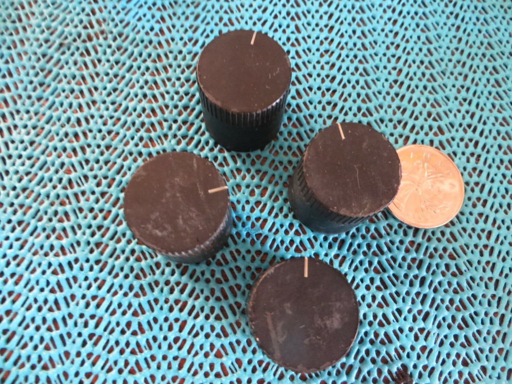 Four radio knobs with spiral flanged end