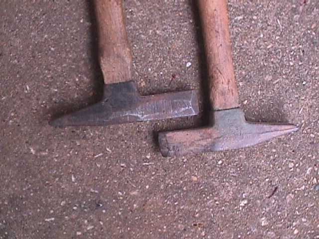 2 VINTAGE STONE CHIPPING HAMMERS
