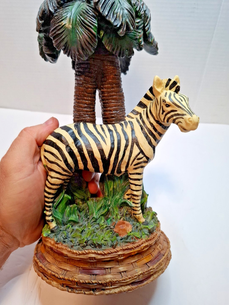 Zebra clock resin sculptured under palm trees 15"Ht. Functioning Clock