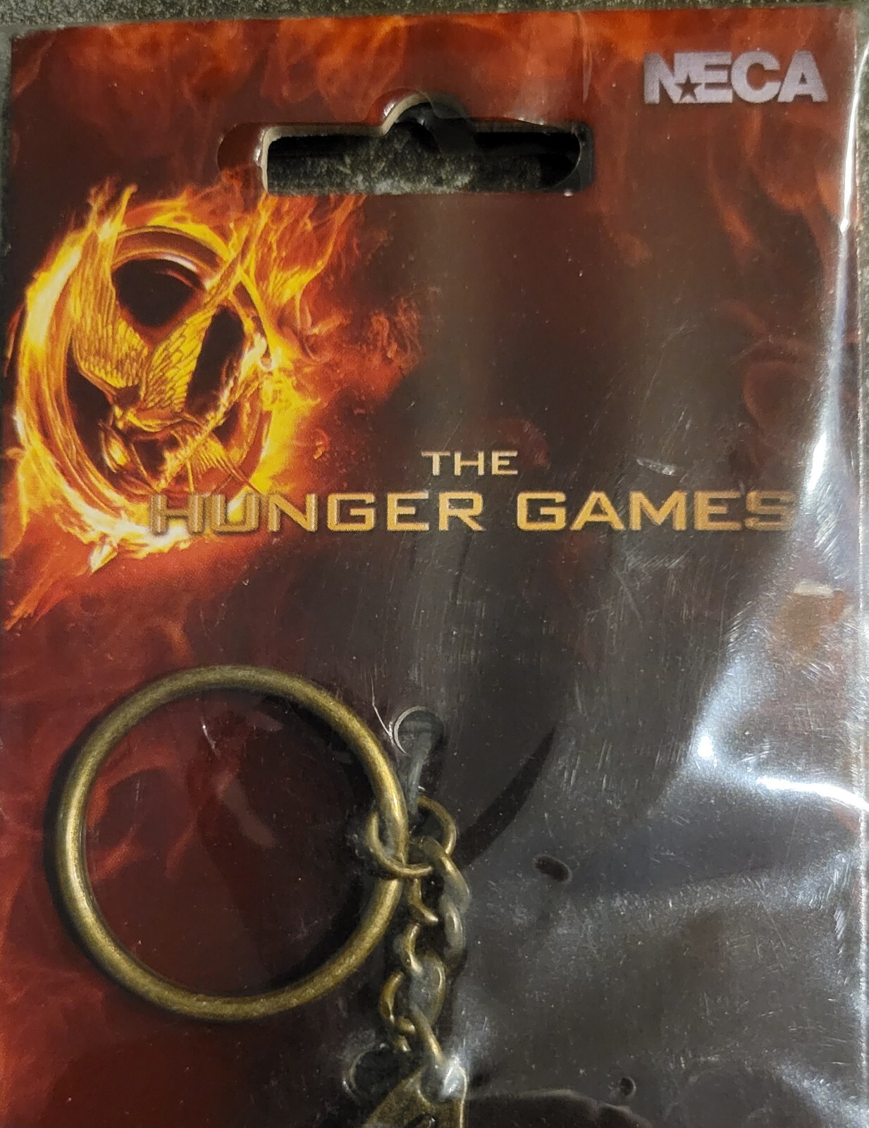 The Hunger Games Mockingjay Cutout Metal Keychain NECA 2012 Lions Gate Films TM