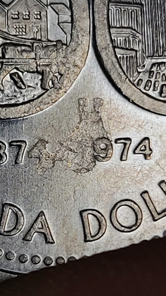 Canada 1974 Winnipeg Nickle Dollar Error Struck Through Grease (INVT54)