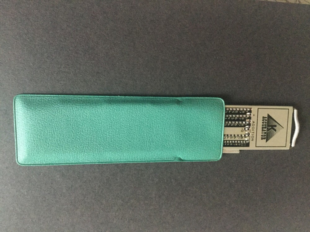 K ACCURATOR. POCKET ADDING MACHINE EXCELLENT CONDITION