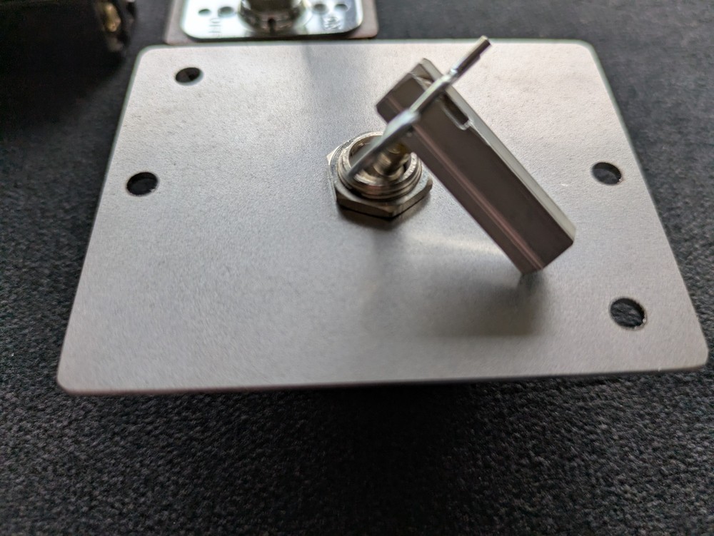 HEAVY DUTY DOUBLE POLE TOGGLE SWITCH - MACHINED WITH A FLAT BLADE HANDLE