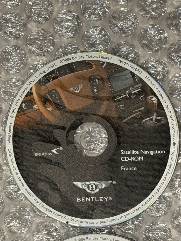 2004 Bentley Continental GT 7 Navigation Disc Set & Bentley Disc Case.