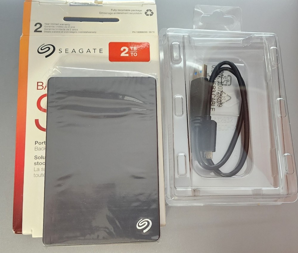 BACKUP PLUS SLIM SEAGATE 2TB EXTERNAL HARD DISK DRIVE USED