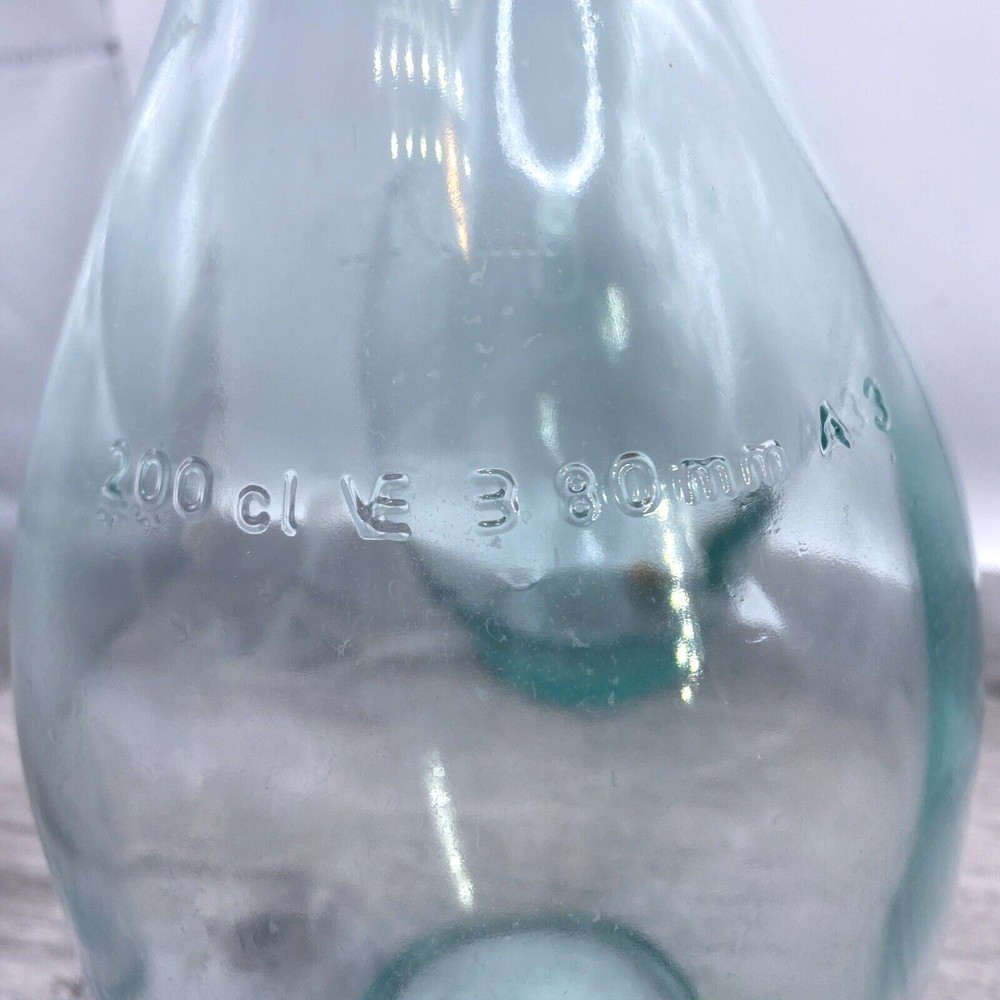 Two old wine bottles - 1 Cork inside - Label Residue