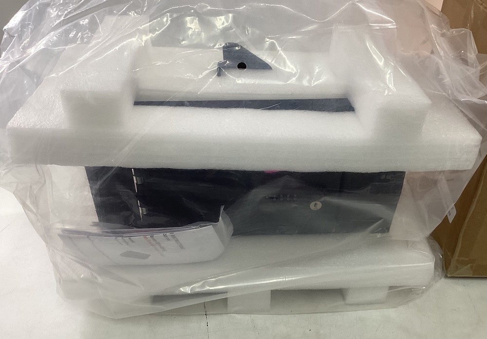 Center Console Gun Safe With Password Retrieval Key.