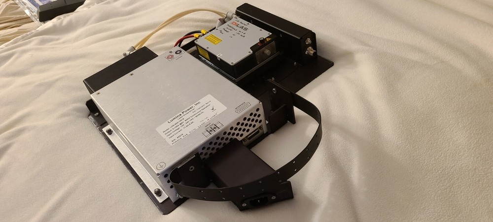 Coherent Laser Dilas with cooling block, interface unit and power supply.