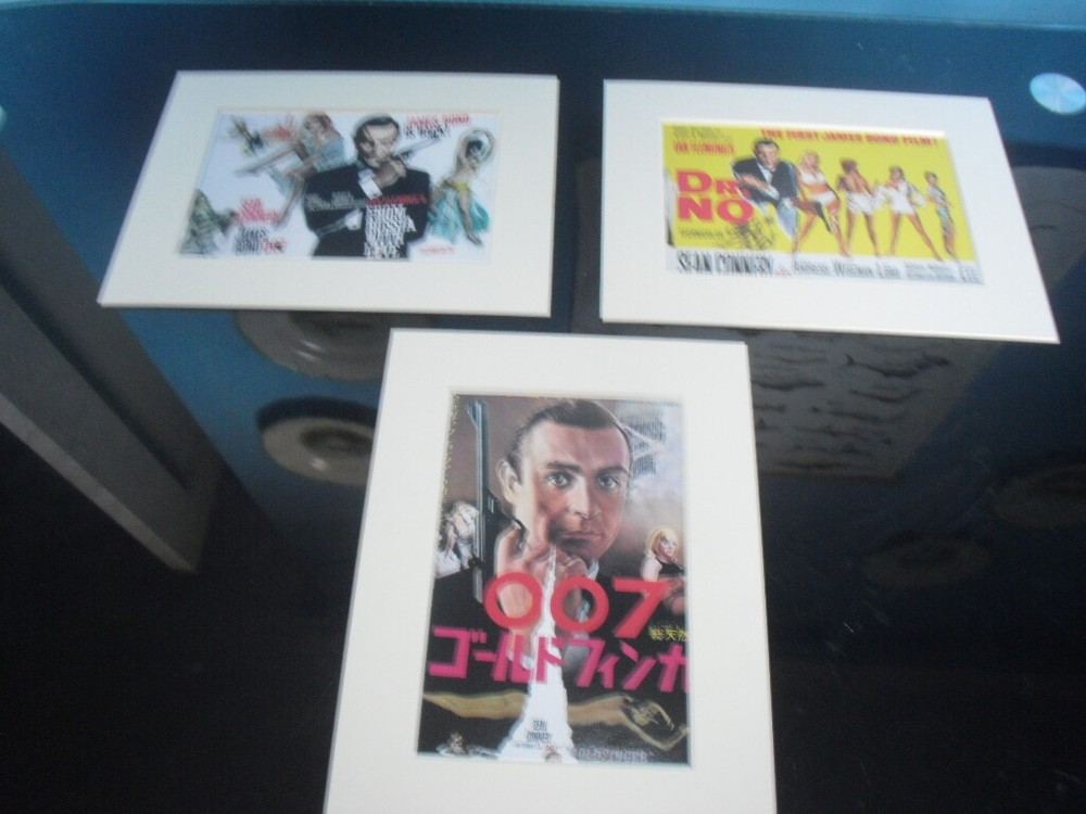 7 Mounted James Bond Prints