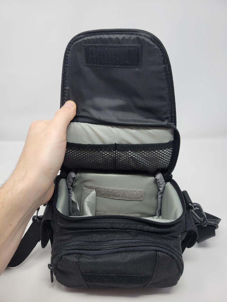 On the Go Lowepro Compact Digital Camera Bag Adjustable Strap Handle Portability
