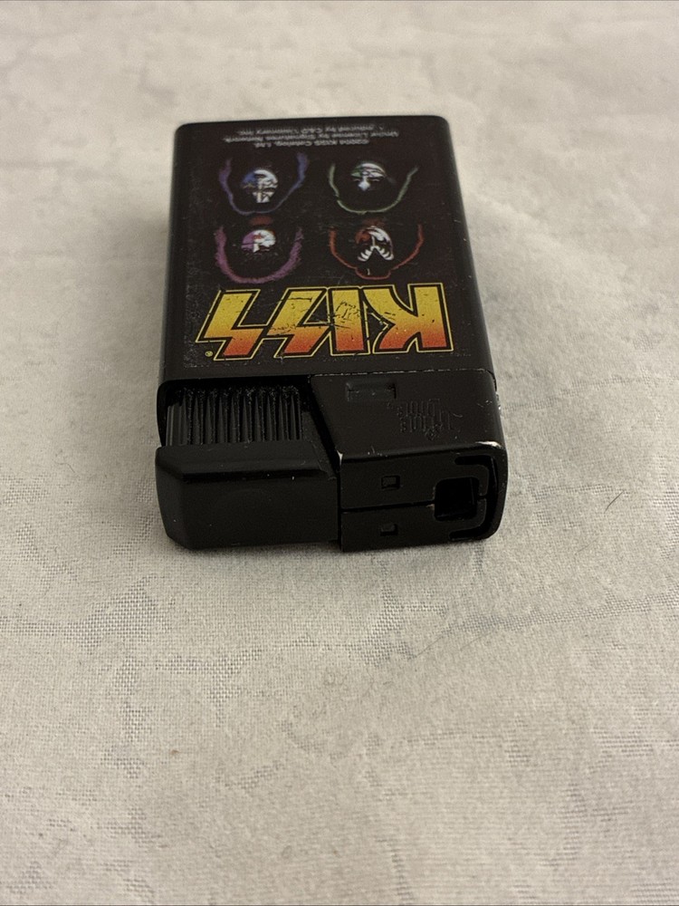 Vintage KISS Tite Rite Lite Lighter Refillable 2004 Catalog