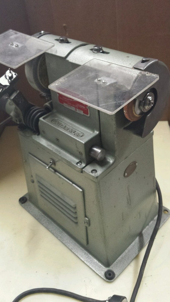 Precision sharpening machine for ACE STRIP CUTTER KNIVES.