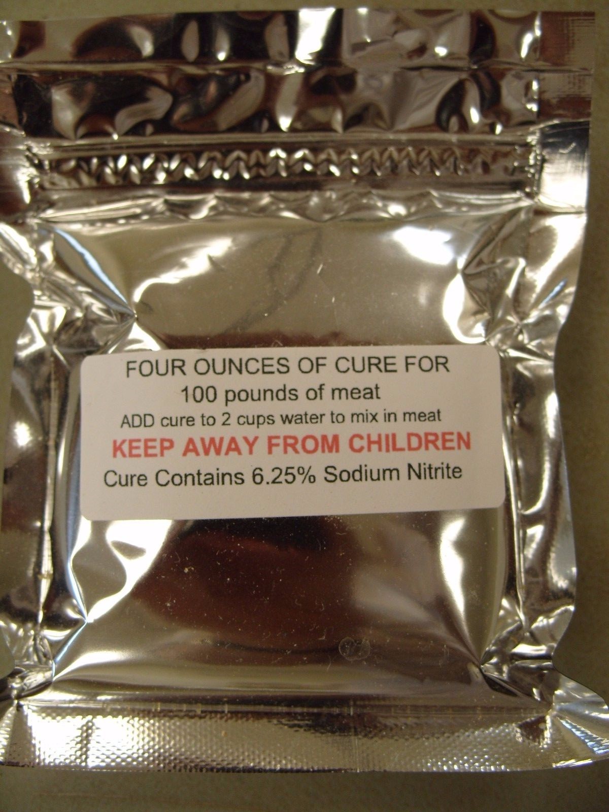 Cure for sausage ; pink fast cure for 100 pounds of meat, 4 ounces