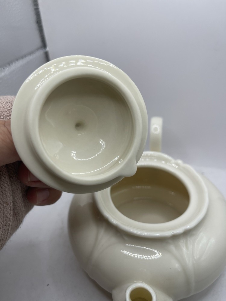 Vintage Ivory Ceramic Teapot with Unique Loop Handle – Elegant Leaf Pattern
