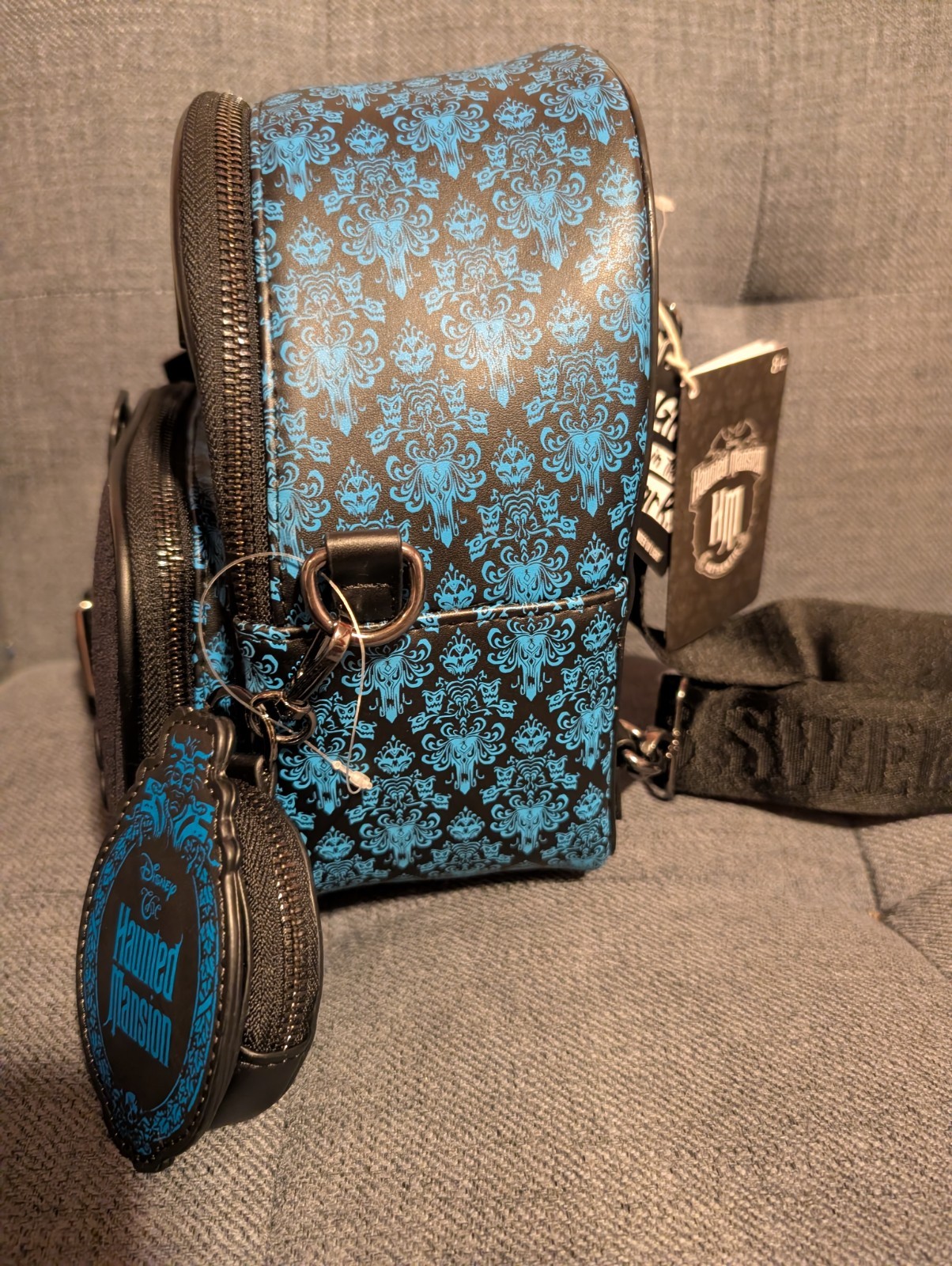 Loungefly Disney Haunted Mansion Hitchhiking Ghosts Convertible Glow Backpack