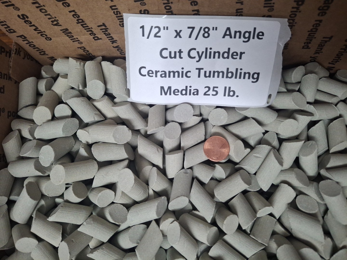 1/2" x 7/8" Angle Cut Cylinder Abrasive Ceramic Tumbling Media - 25 lb.