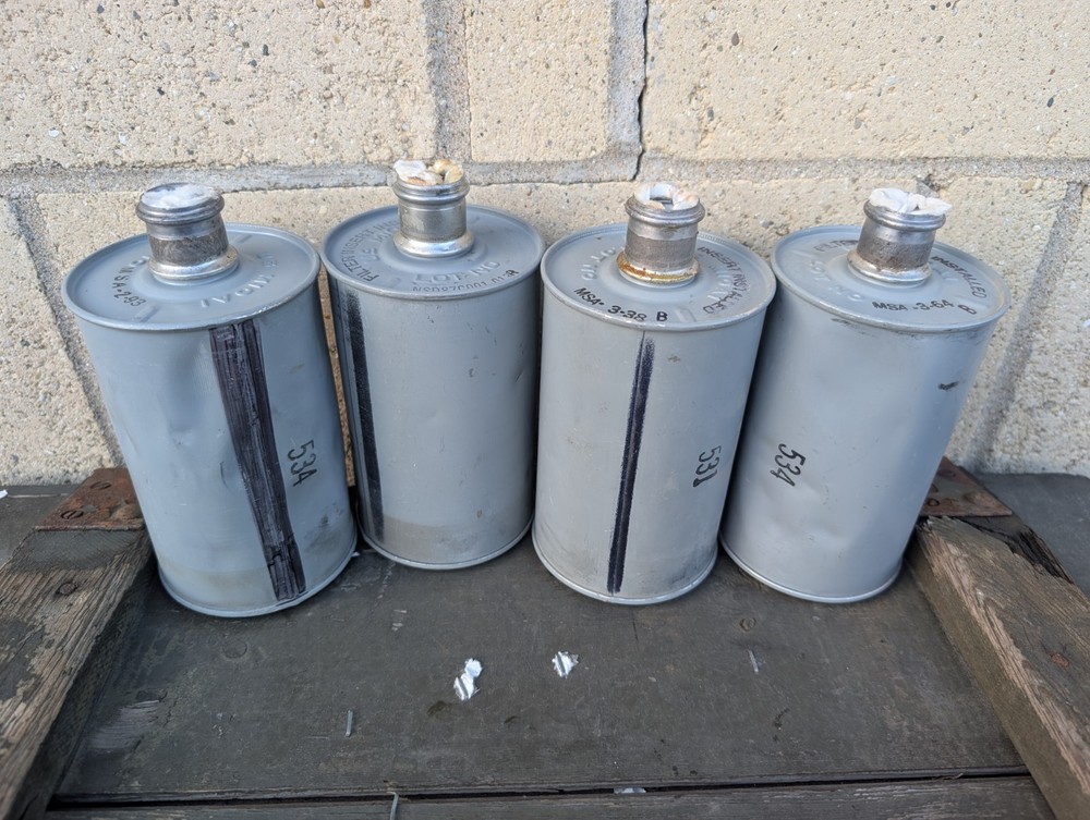 US M10A1 Gas Mask Filter - Used, Dented