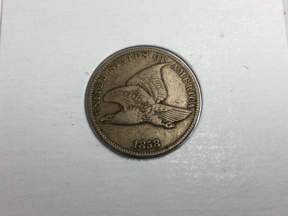 1858/1857 Flying Eagle Cent double date in very fine