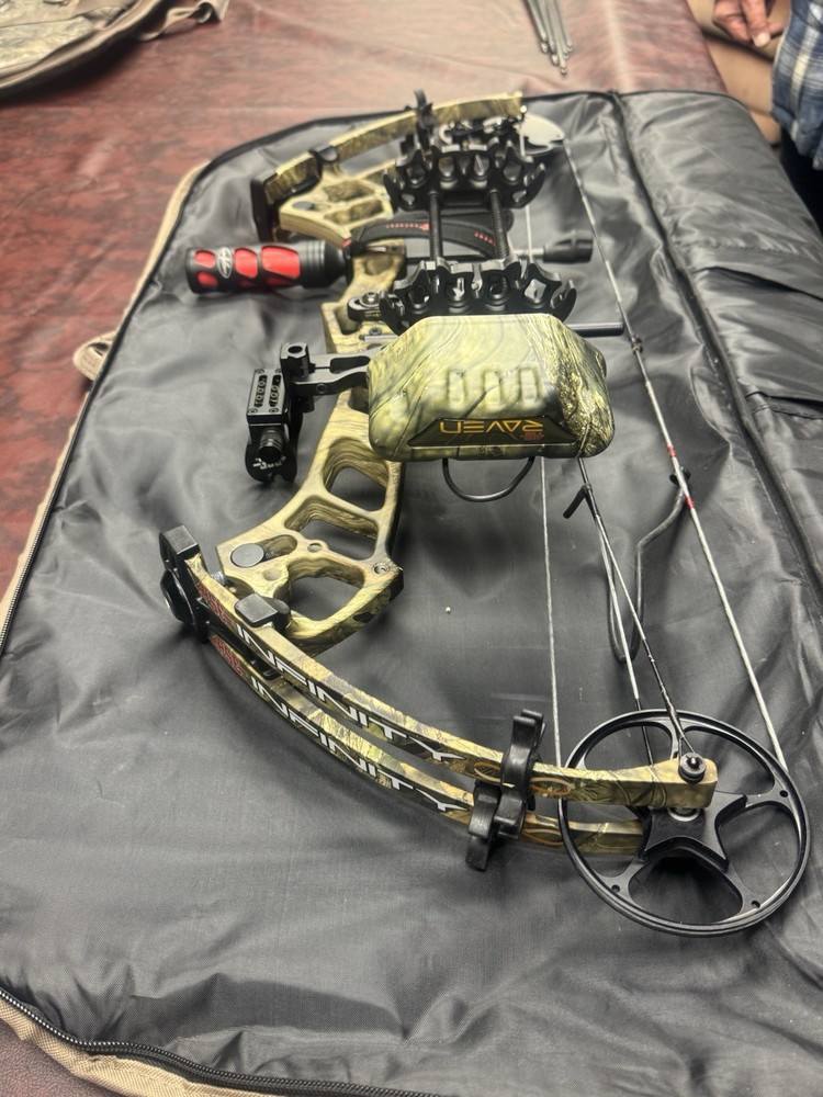 PSE Infinity Camouflage Compound Bow with Sight and Accessories