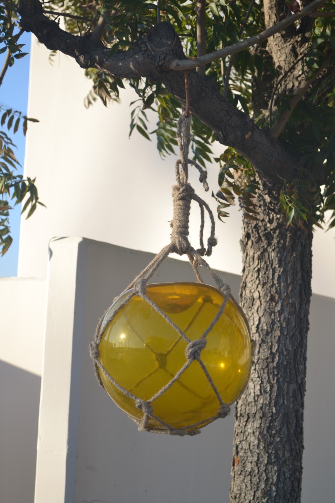 REPRODUCTION YELLOW GLASS FLOAT BALL WITH FISHING NET 12"