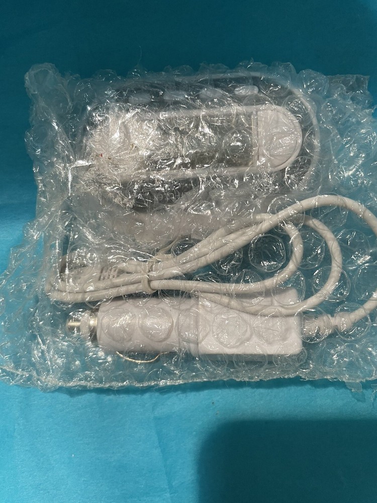 In Car FM Transmitter w Charger Model SP2202