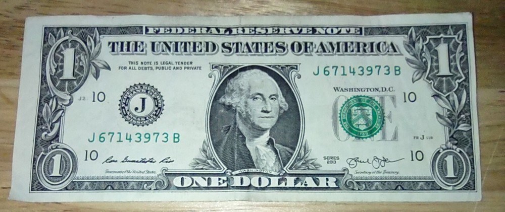 ONE DOLLAR NOTE WITH UNEVEN BORDERS ERROR.  U S. FEDERAL RESERVE NOTE.