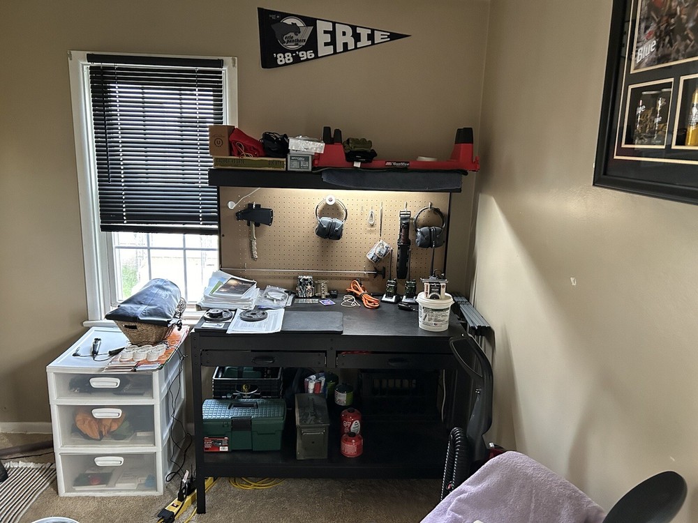 Work Bench With Pegboard Back And Overhead Light.