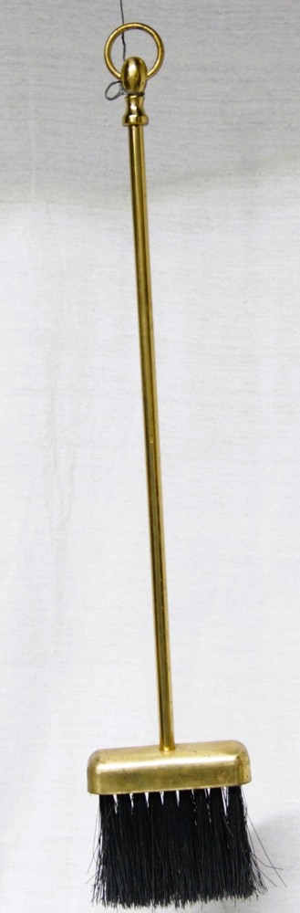 Four-piece brass fireplace poker set