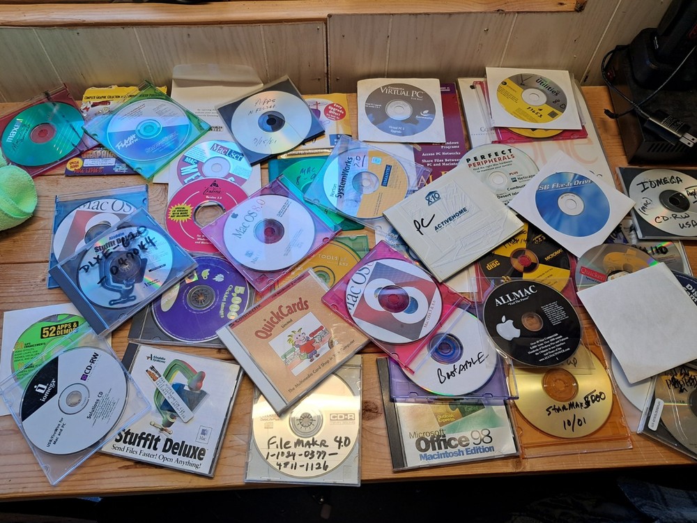 40 assorted vintage Mac CD Roms. Mostly from the Power Mac Era.