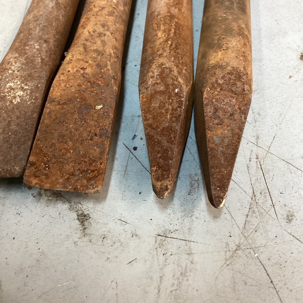 Four 8-1/2” Hammer Bits 2 Moil Point And 2 Flat Chisel
