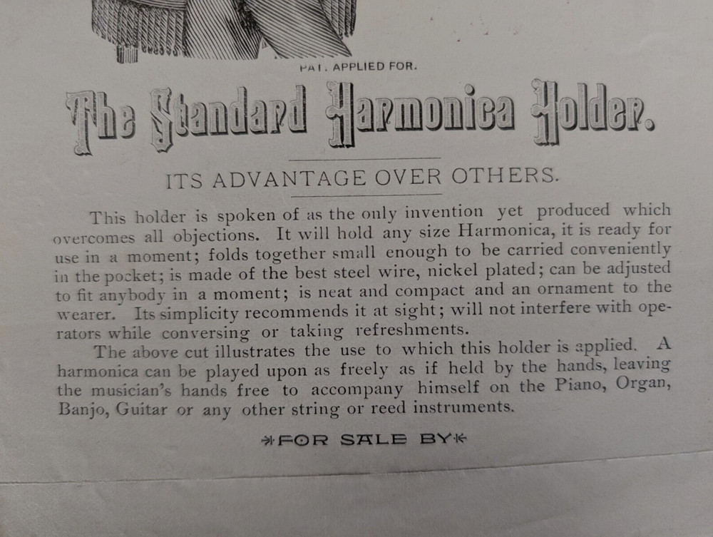 Antique Harmonica Holder Advertisement