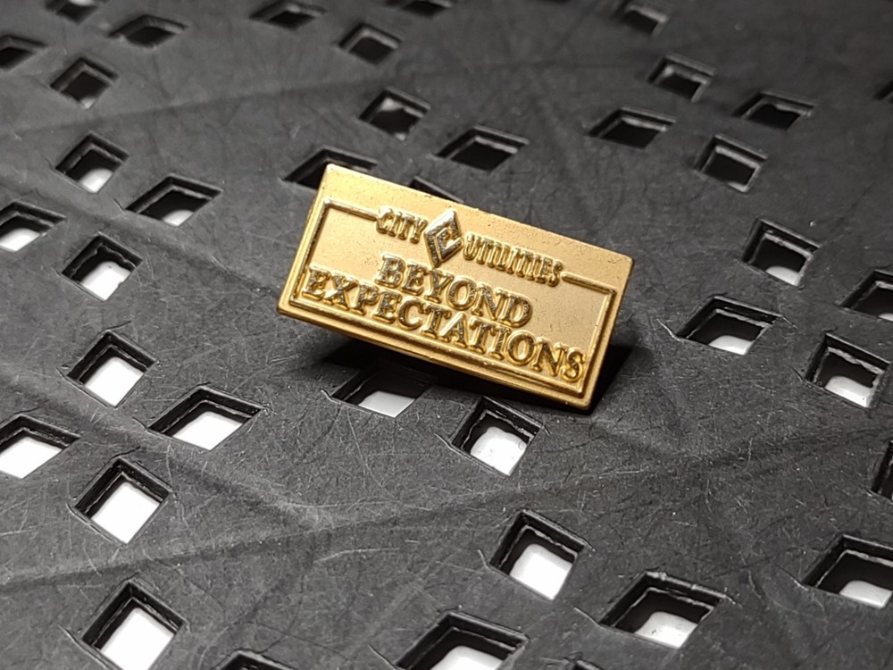 City Utilities Beyond Expectations Rectangular Pin