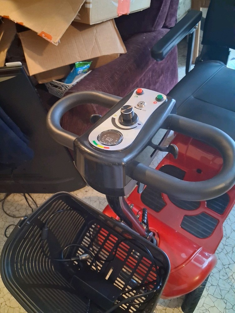 Red Mobility Scooter.