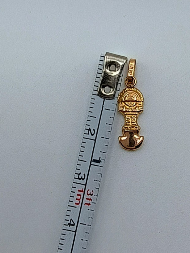 18k gold peruvian tumi pendant
