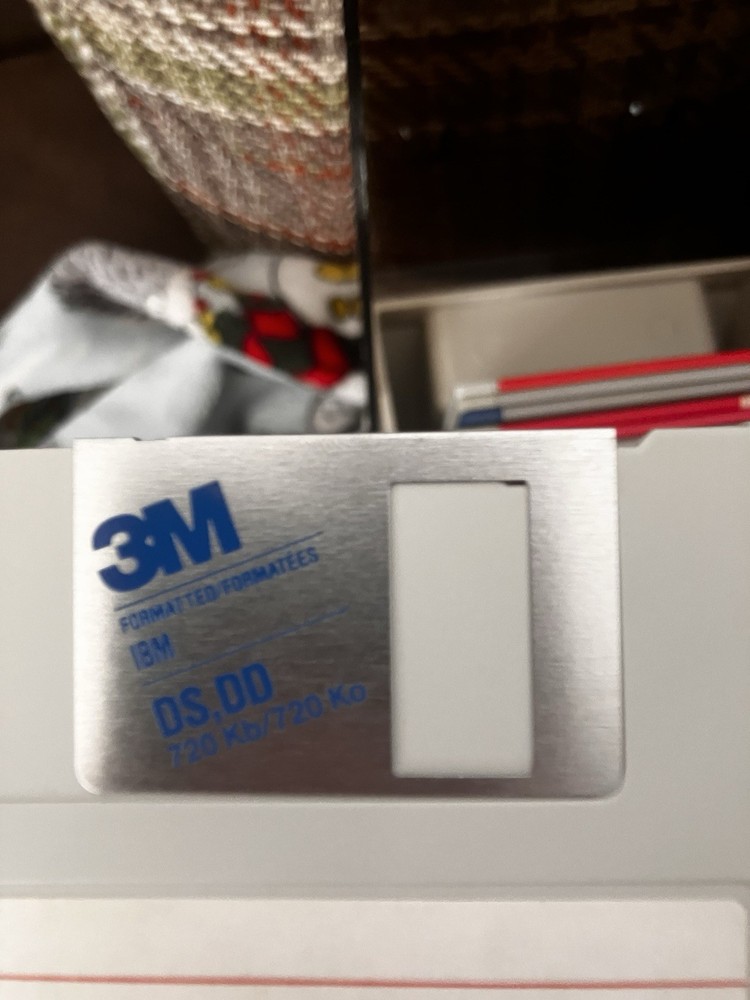 Commodore Amiga random 50 Disk Lot - 3.5" DS/DD. Includes Disk Caddy/Box